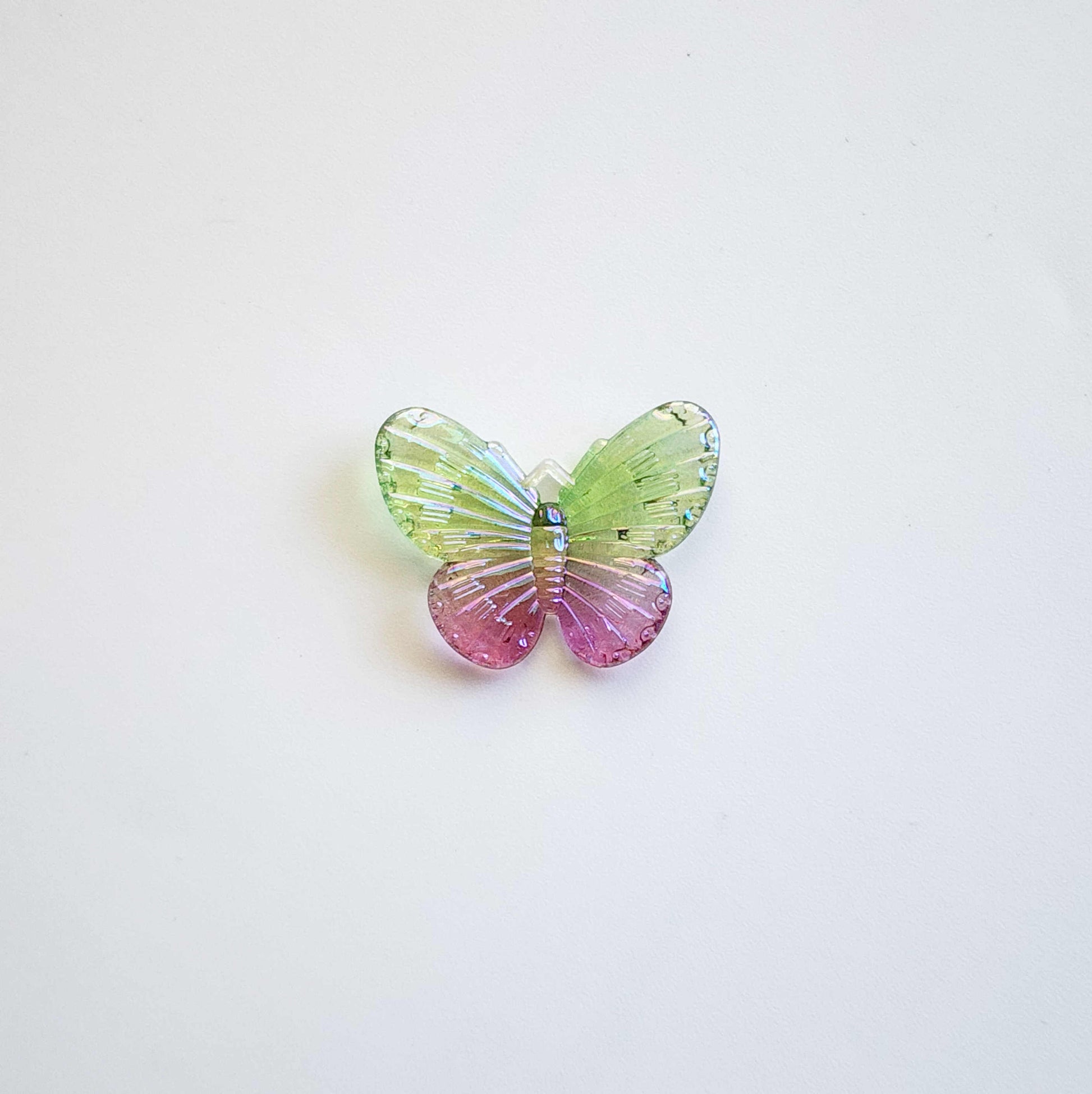 Green and purple butterfly acrylic charm