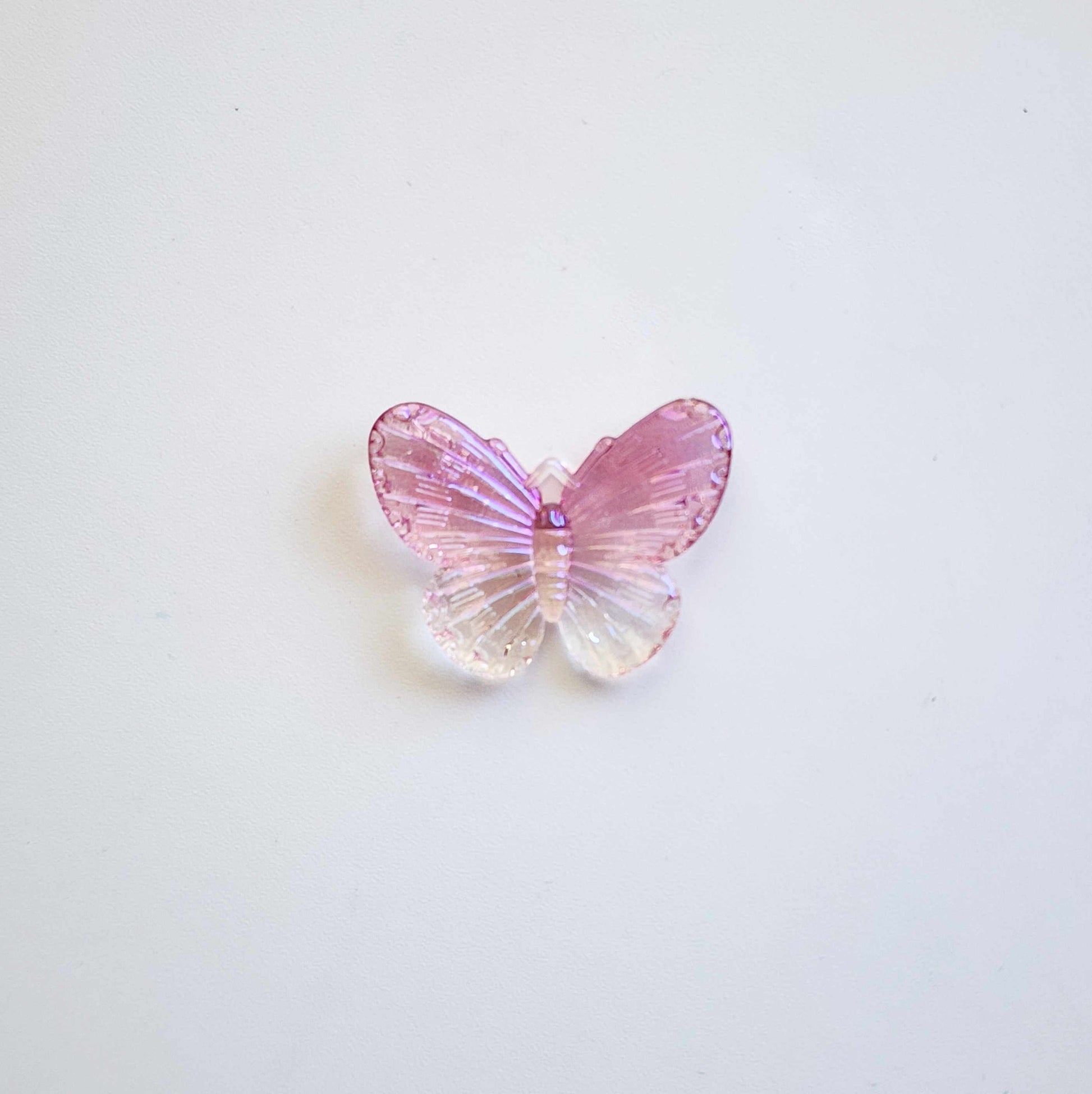 Pink and white butterfly acrylic charm