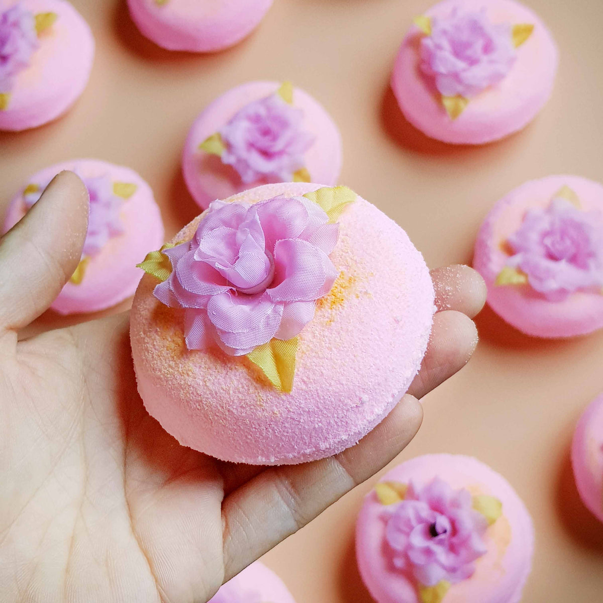 Pink rose doughnut bath bomb with flower