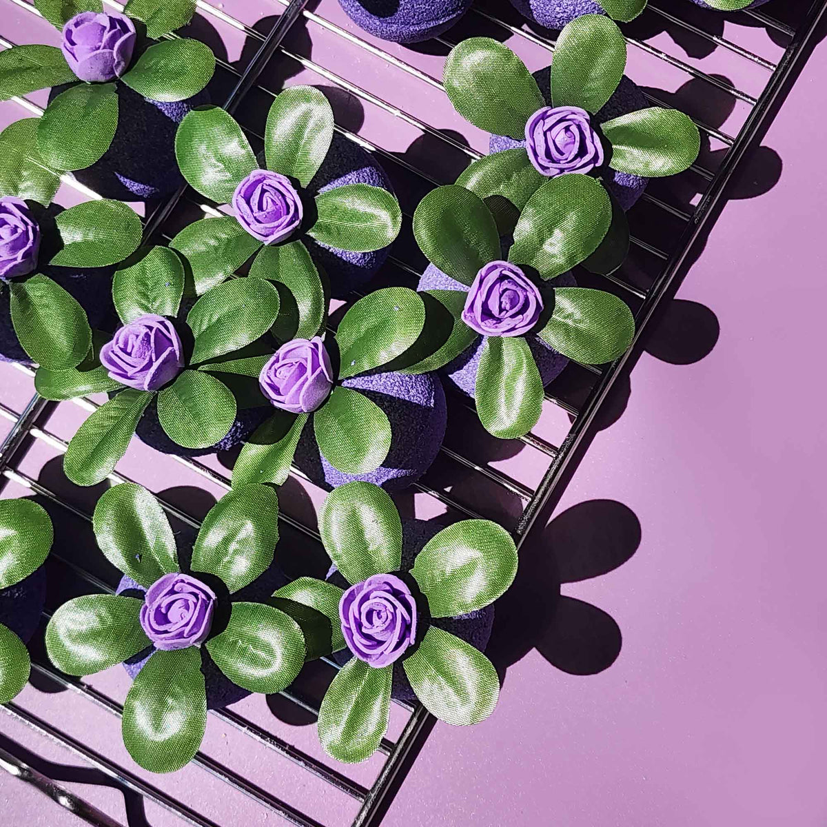 Tray of purple Wild Berry bath bombs decorated as flowering succulents