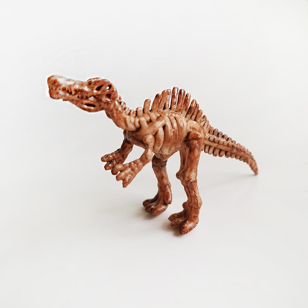 Toy Spinosaurus skeleton dinosaur fossil
