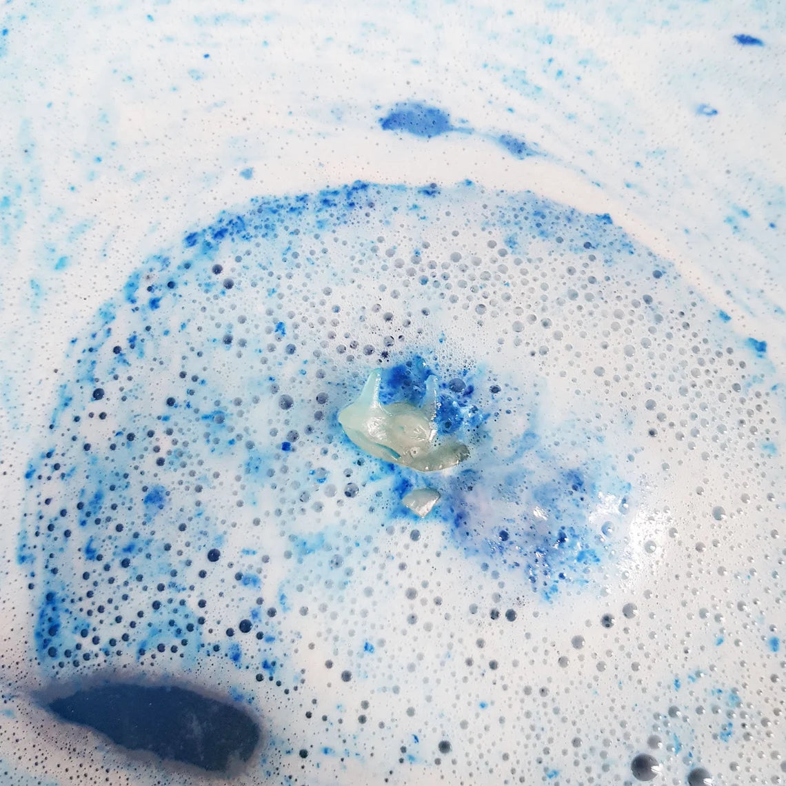 Surprise toy dinosaur bath bomb