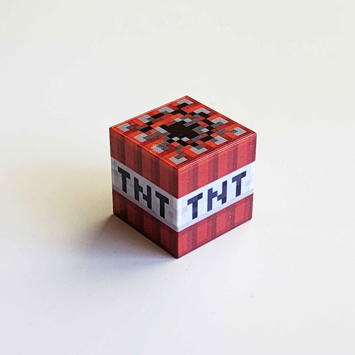 a TNT textured magnetic minecraft building block