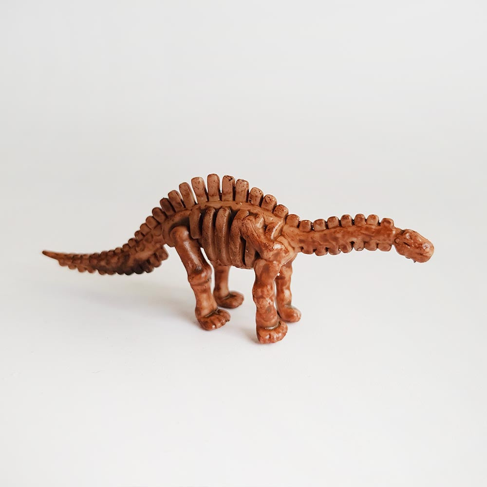 Toy Diplodocus skeleton dinosaur fossil
