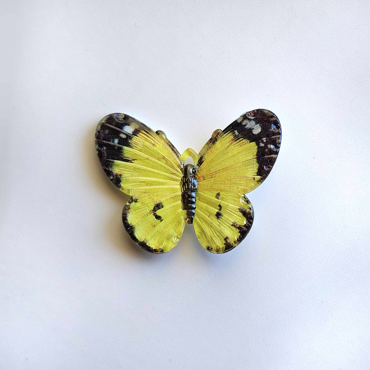 bright yellow acrylic butterfly charm