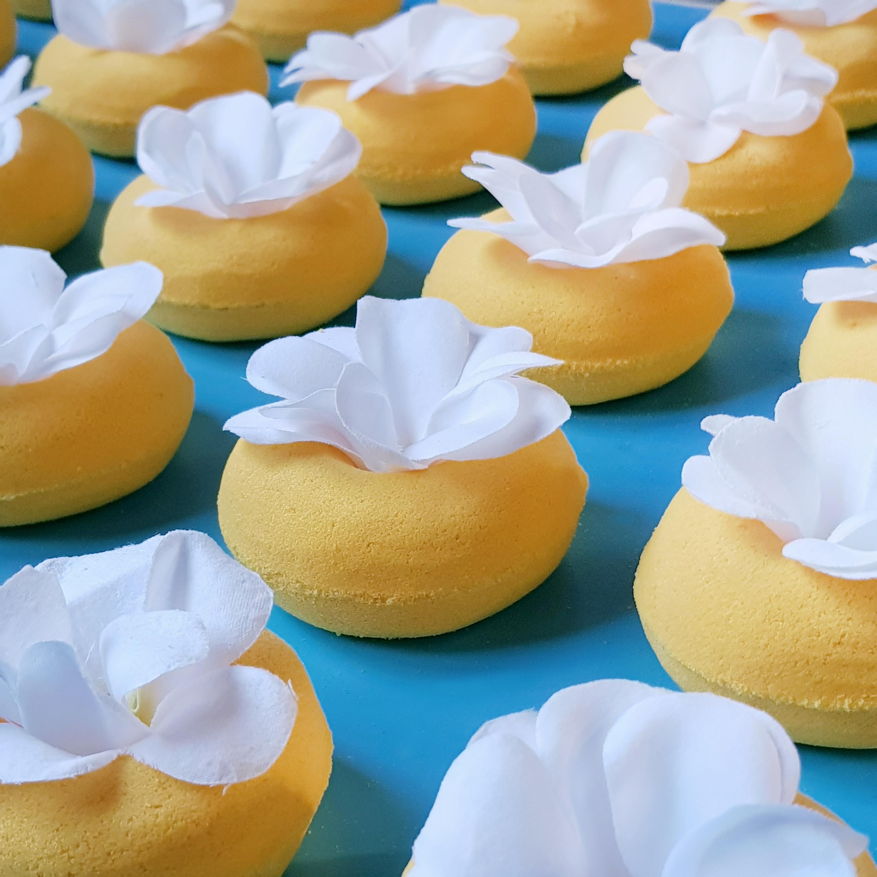 Yellow frangipani doughnut bath bomb