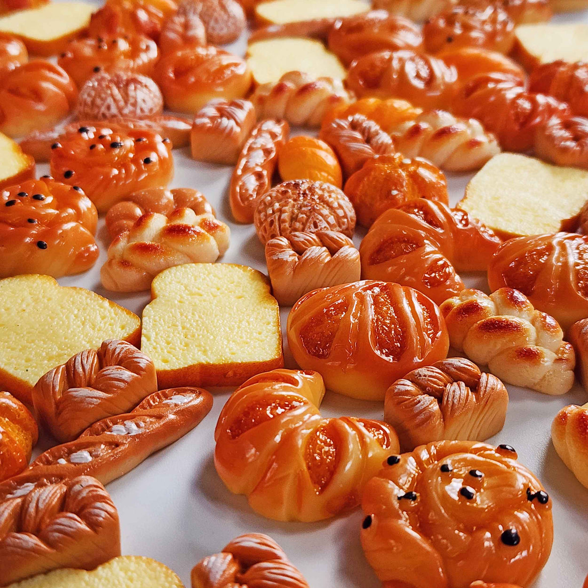 Close-up of assorted miniature bread surprise toys