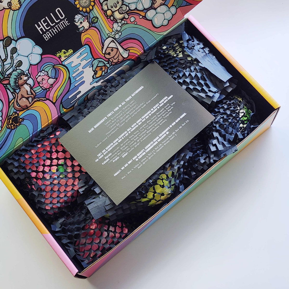 Vibrant bath bombs in a colourful gift box