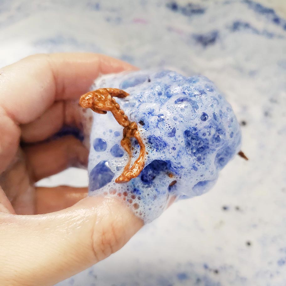 animal crossing fossil bath bomb with dinosaur skeleton