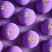 Purple Relax aromatherapy bath bombs topped with dried lavender