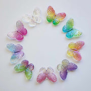 Circle of acrylic butterfly charms in an array of vibrant colours