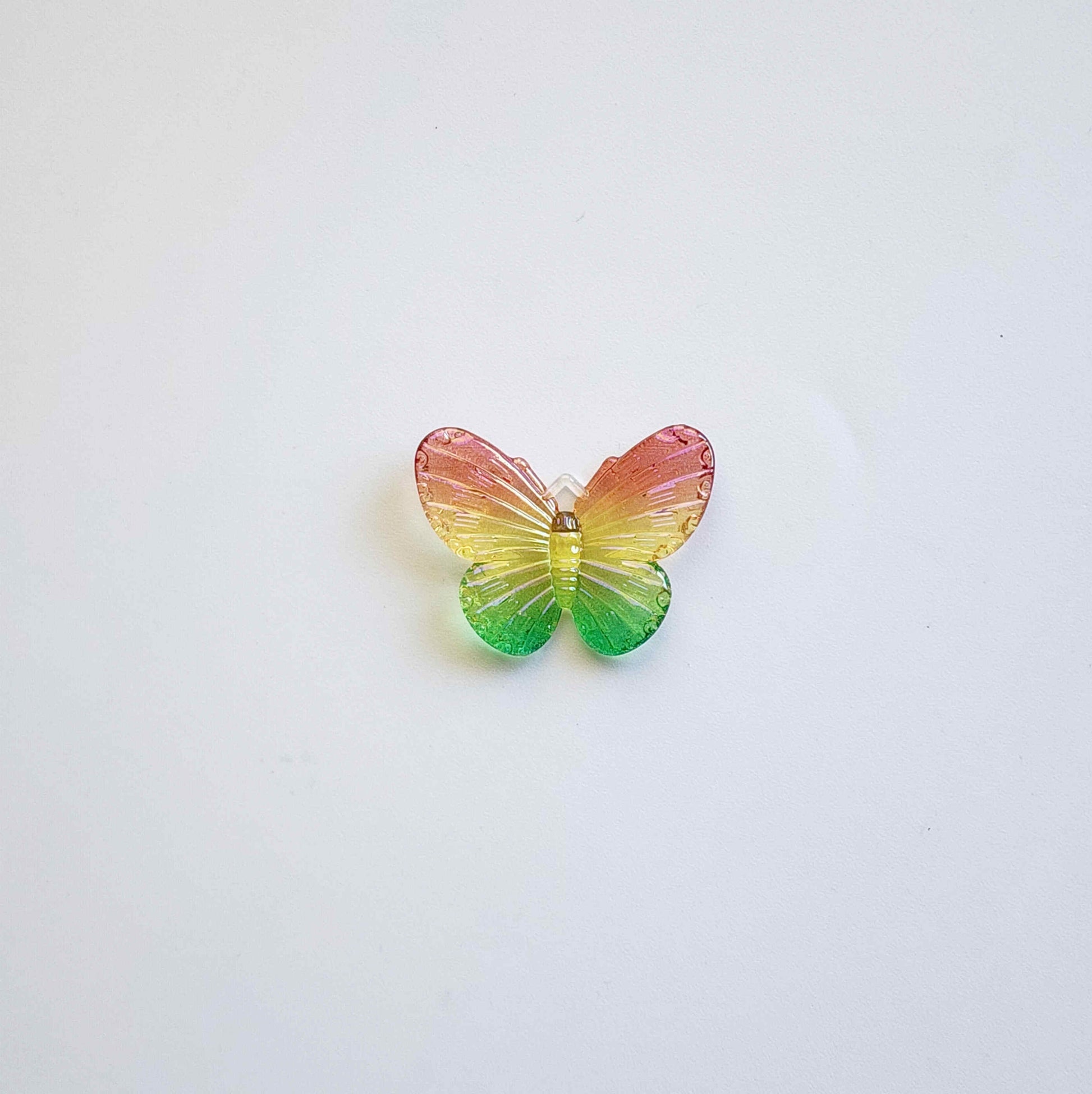 3 toned red, yellow, and green butterfly acrylic charm