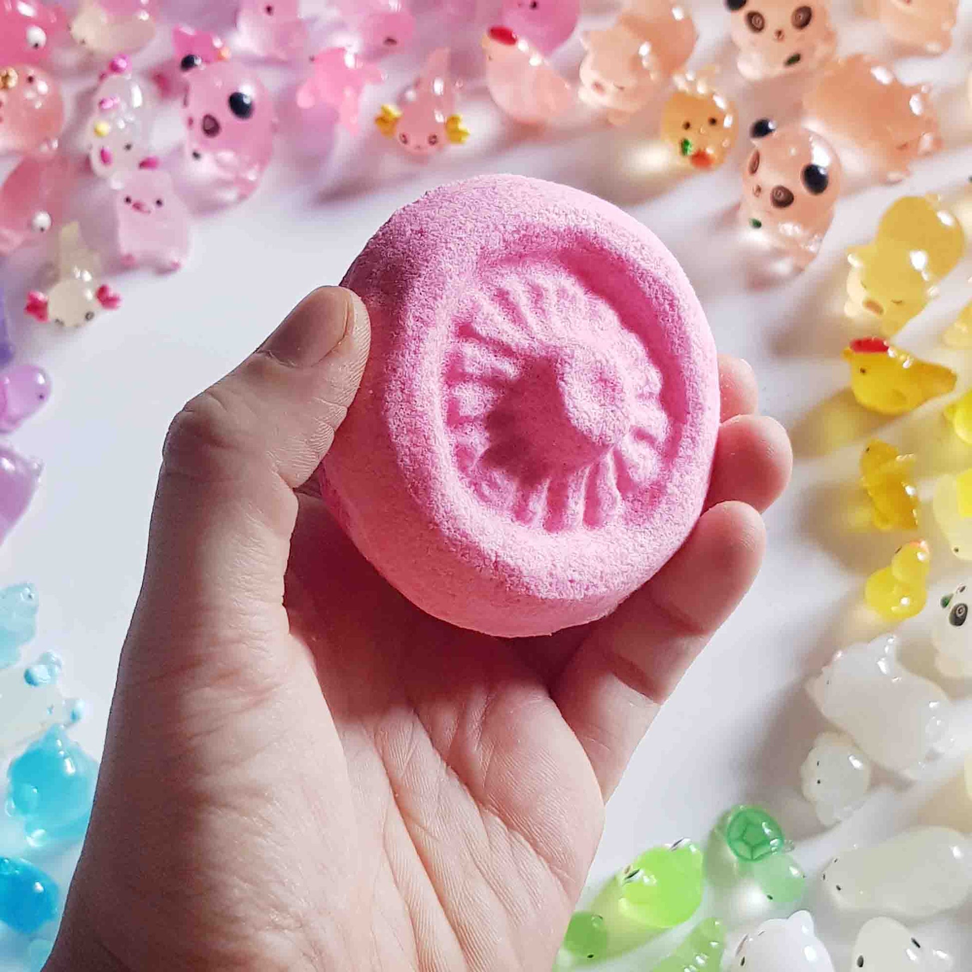 Close-up of the molded underside of a pink mushroom bath bomb