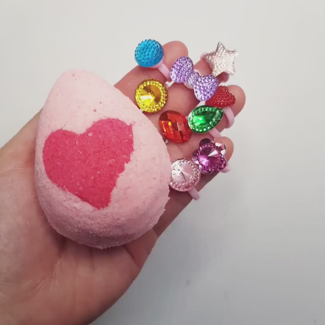 Load video: surprise toy bath bomb ring and butterfly demo